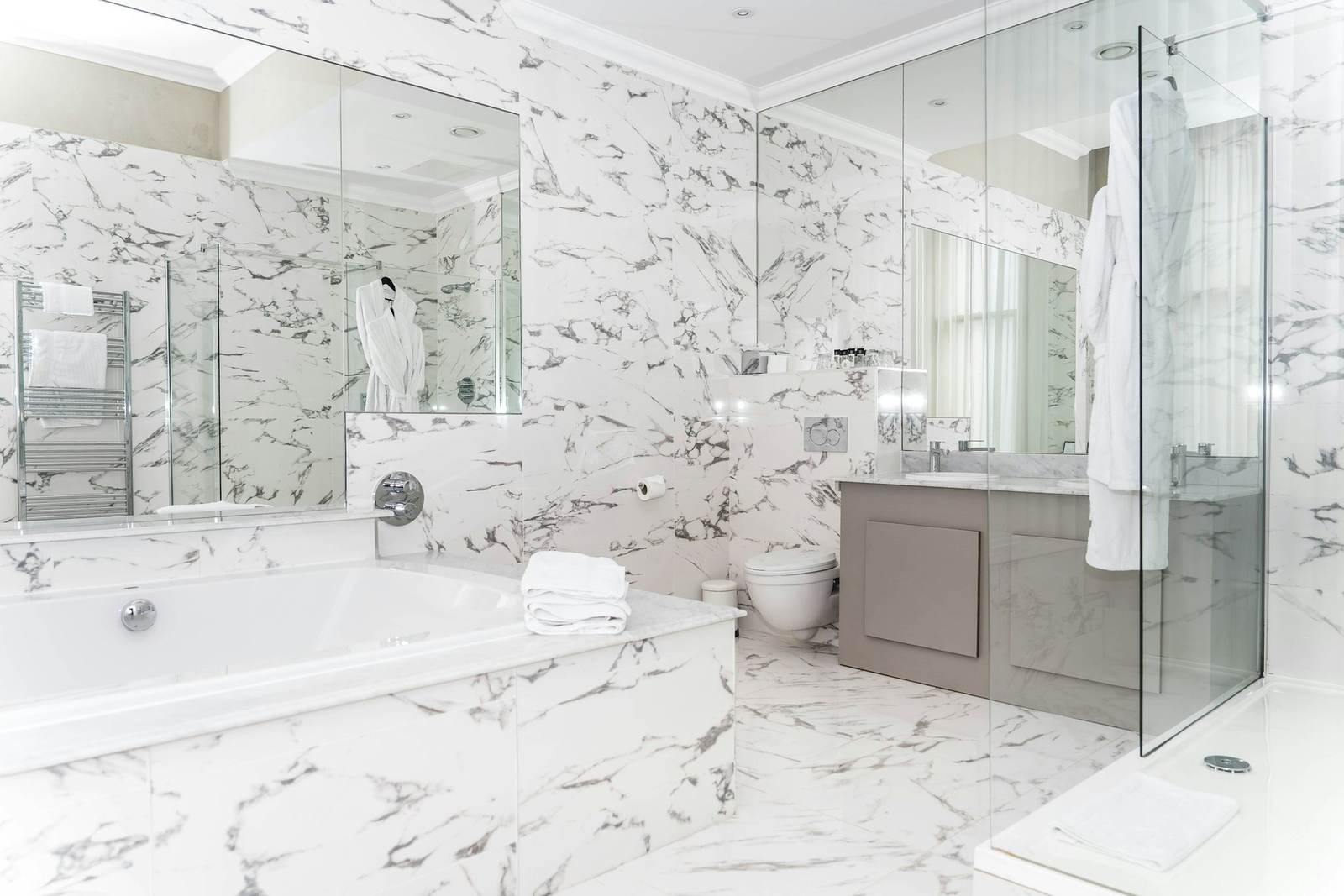 Bathroom with marble floor and walls