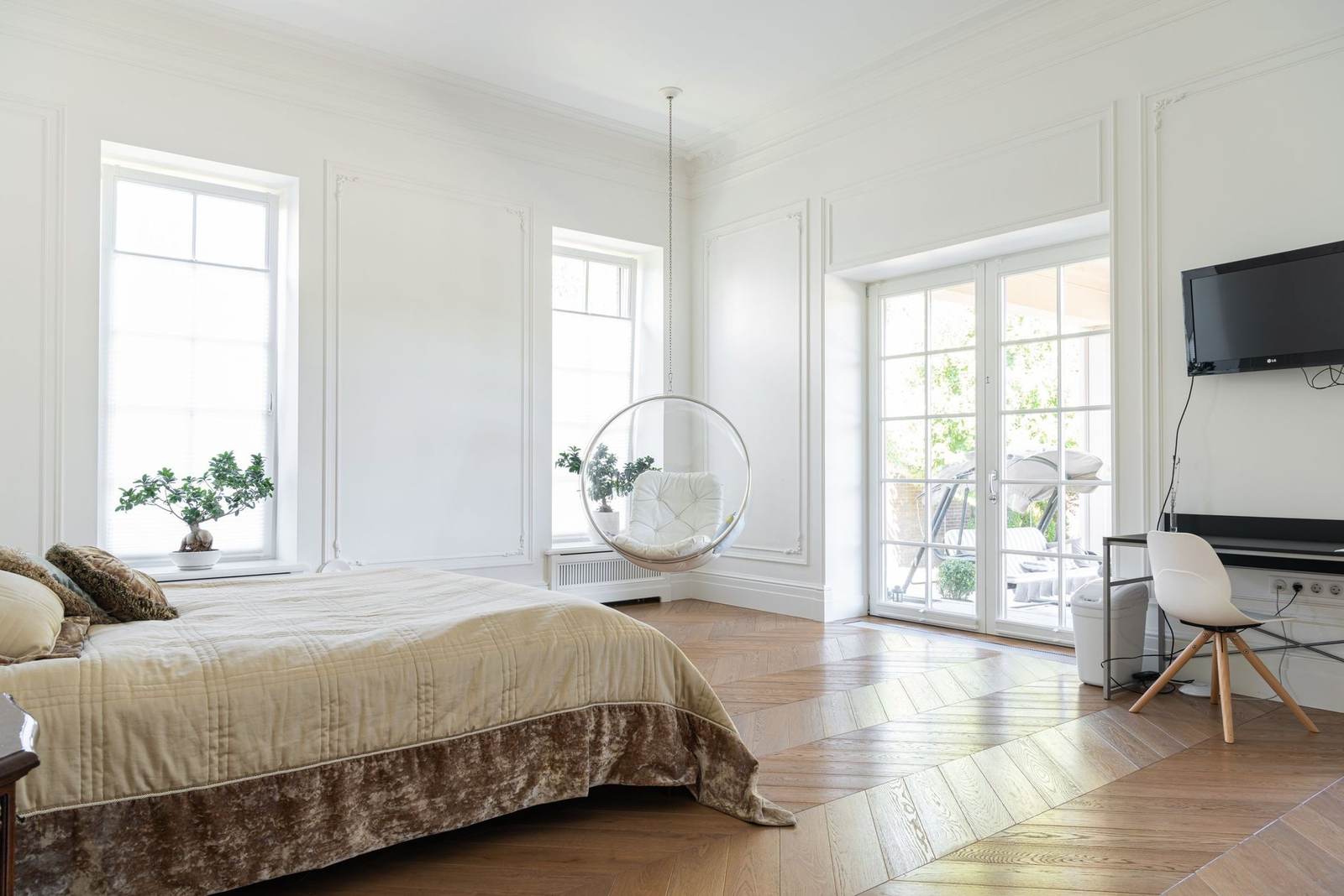 Herringbone oak floor in a bedroom