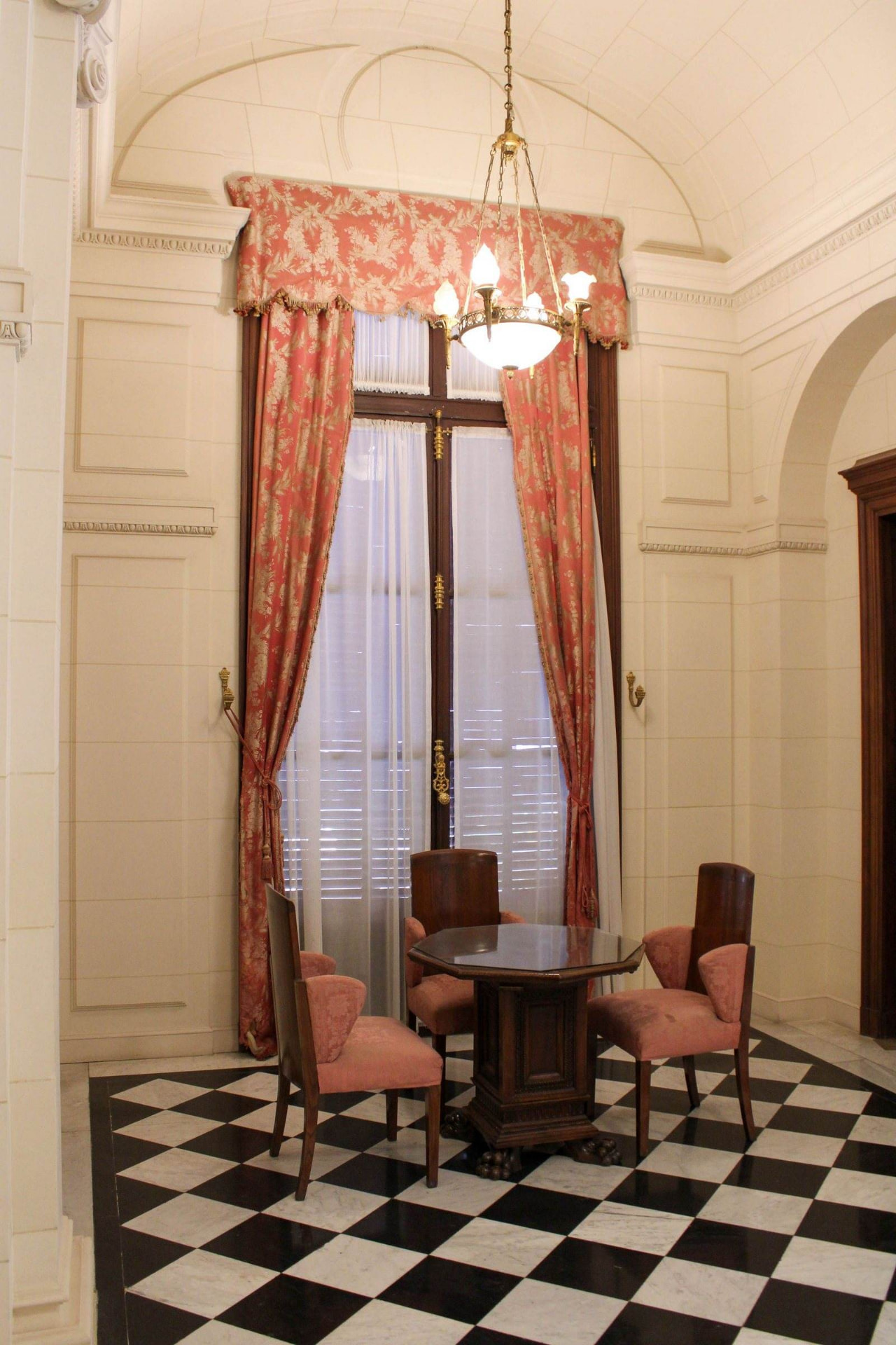 Checkerboard marble floor in a dining room
